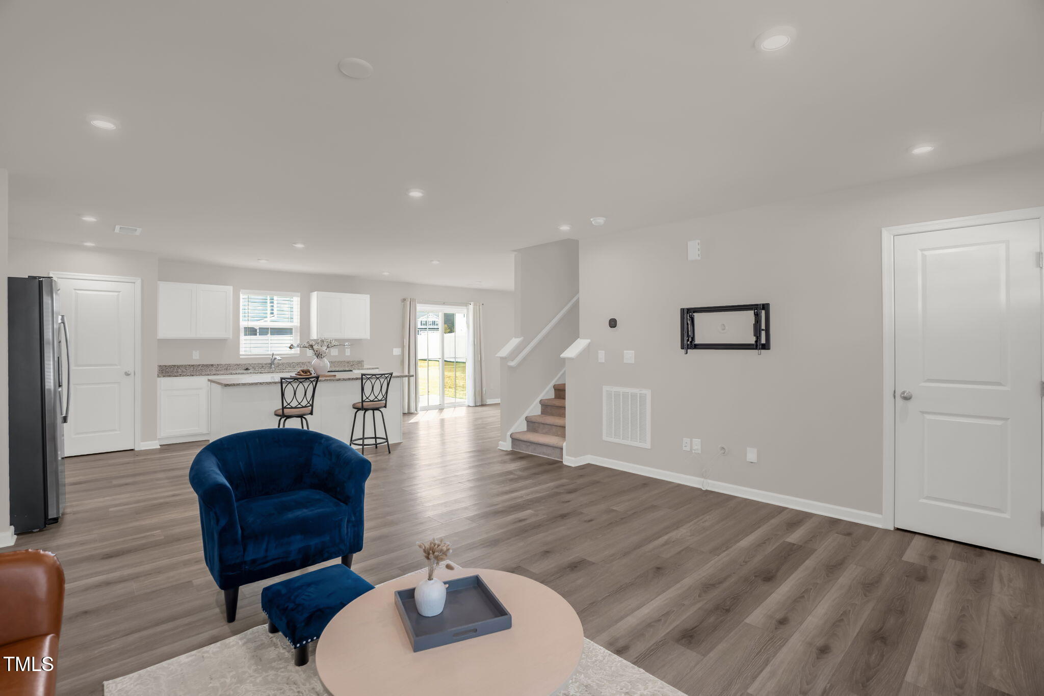 801 Brook Bawn Road Wendell, NC 27591 - Photo 7 of 30 a living room with furniture and a wooden floor