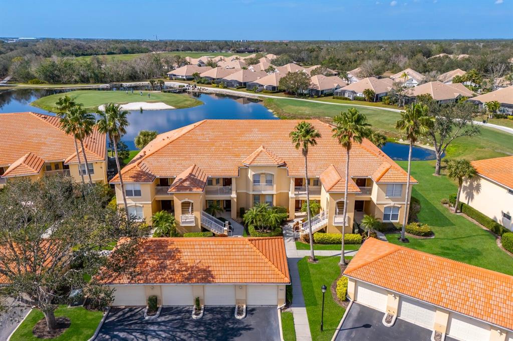 8414 Wethersfield Run, Unit 102 Lakewood Ranch, FL 34202 - Photo 1 of 48 an aerial view of multiple house