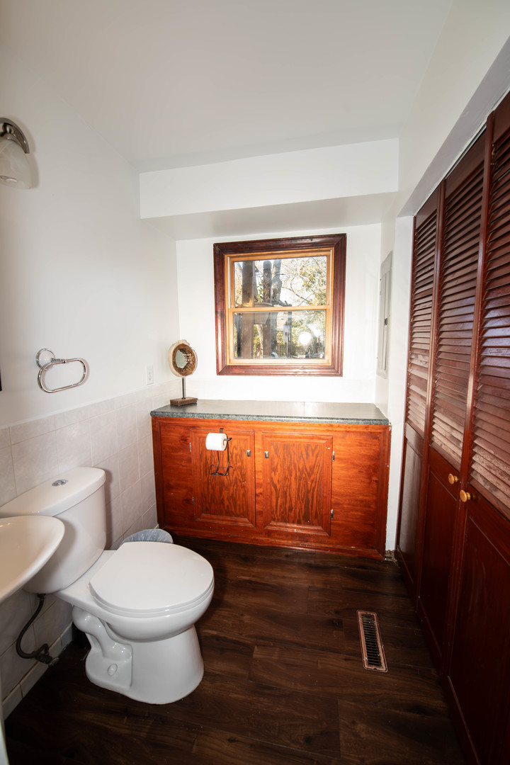 185 South Pinecrest Road Bolingbrook, IL 60440 - Photo 12 of 38 a bathroom with a toilet and a shower