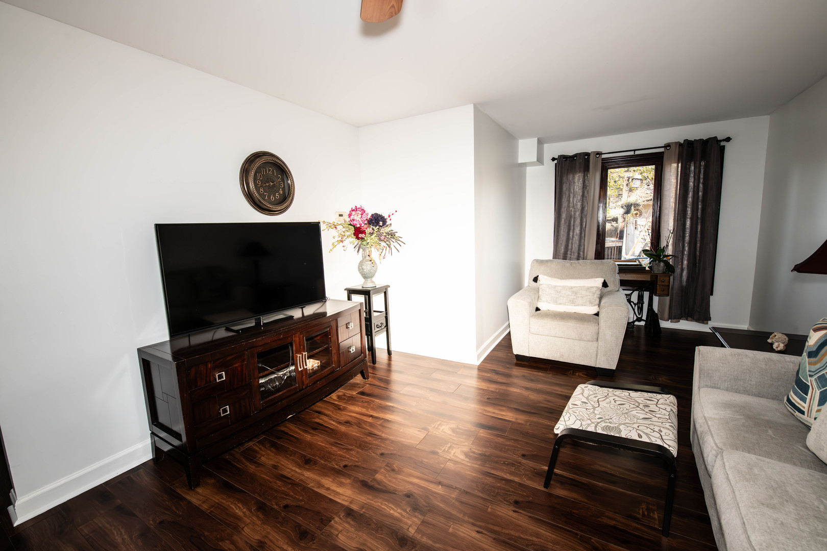 185 South Pinecrest Road Bolingbrook, IL 60440 - Photo 17 of 38 a living room with furniture and a flat screen tv