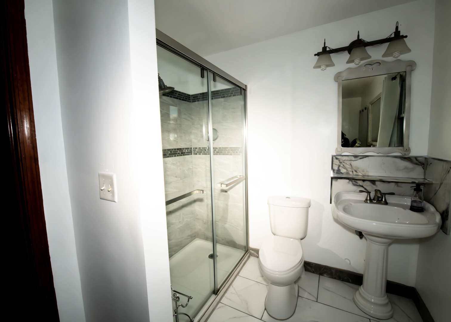 185 South Pinecrest Road Bolingbrook, IL 60440 - Photo 21 of 38 a bathroom with a toilet and a sink