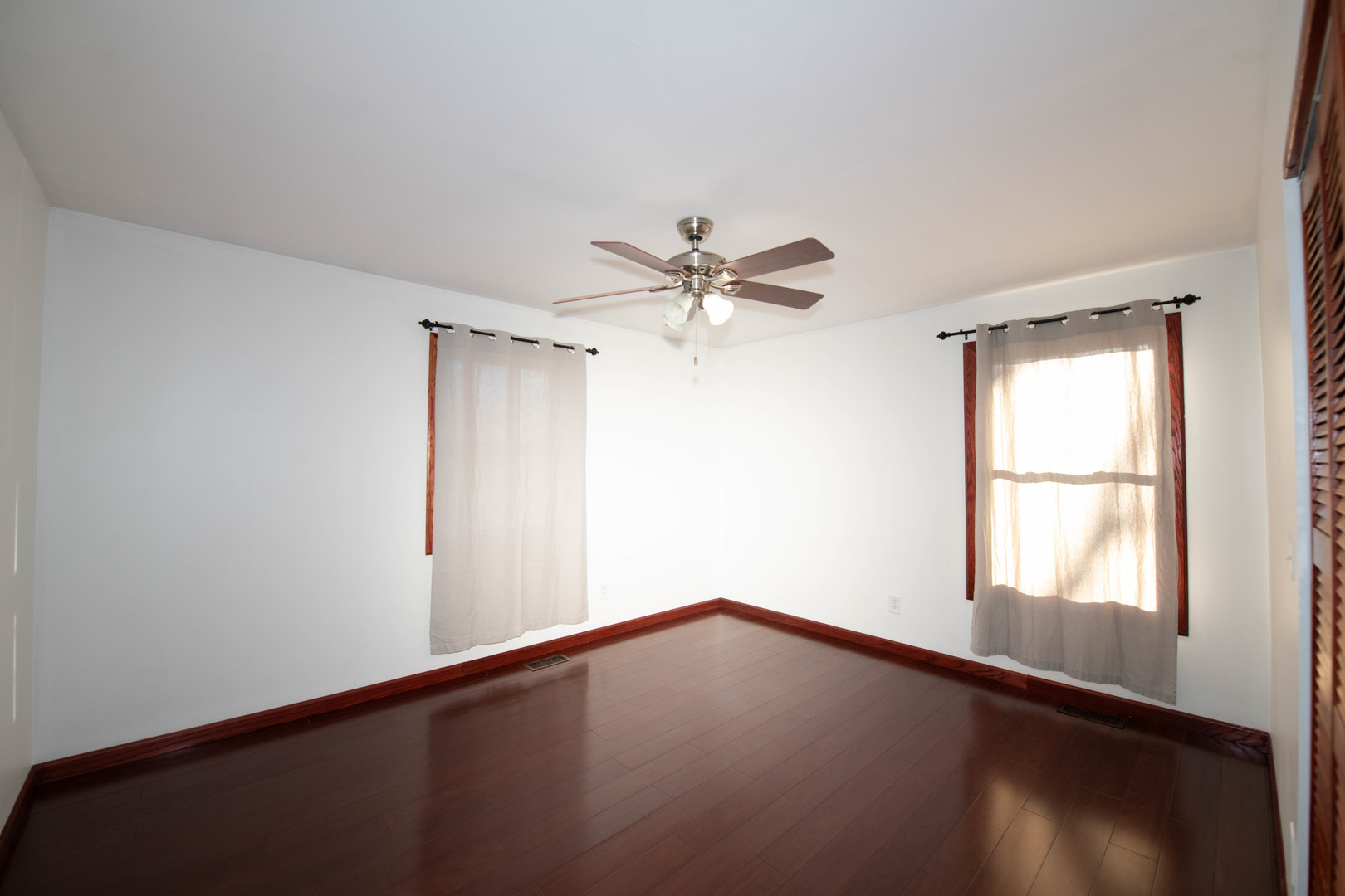 185 South Pinecrest Road Bolingbrook, IL 60440 - Photo 27 of 38 an empty room with a window and a fan