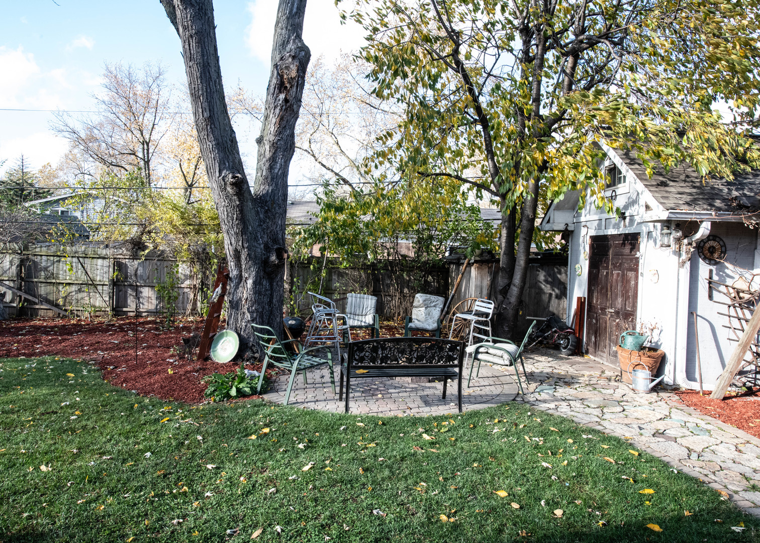 185 South Pinecrest Road Bolingbrook, IL 60440 - Photo 31 of 38 a view of a bench in a backyard