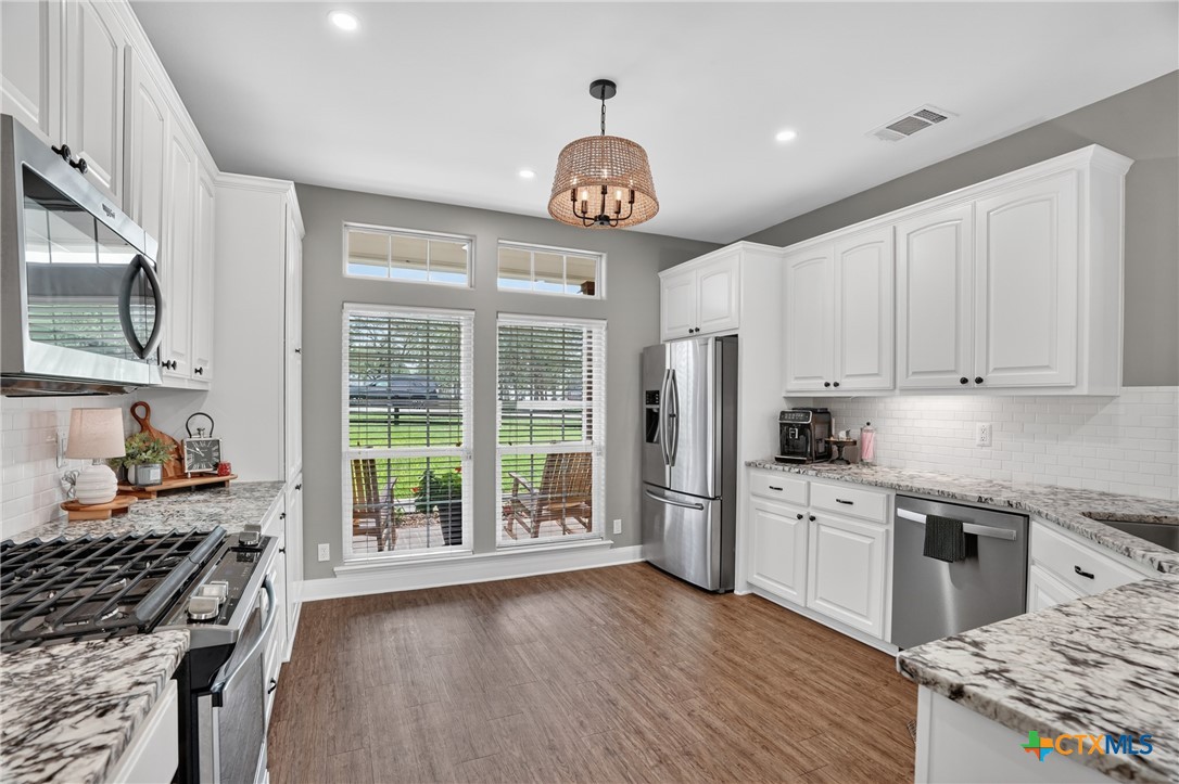 1899 Sunflower Trail Luling, TX 78648 - Photo 12 of 48 Kitchen with enough space to add an island and a breakfast area.
