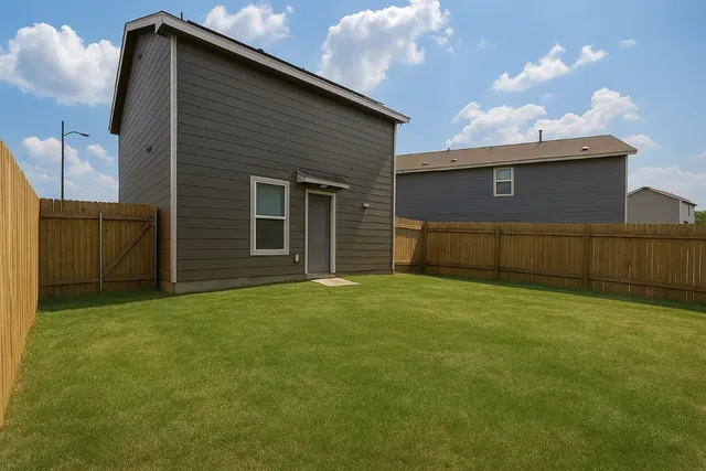 a view of a room with wooden floor a fireplace
