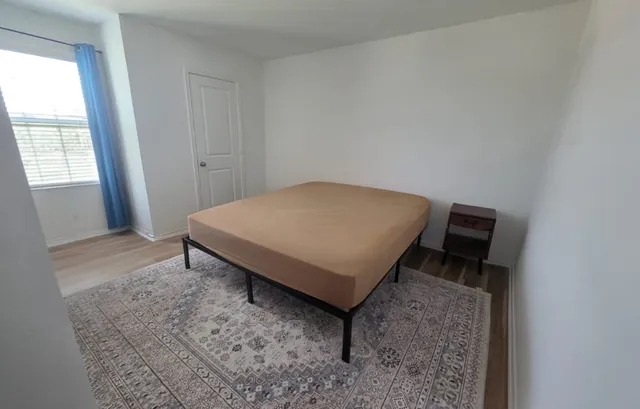 a bathroom with a toilet and a sink