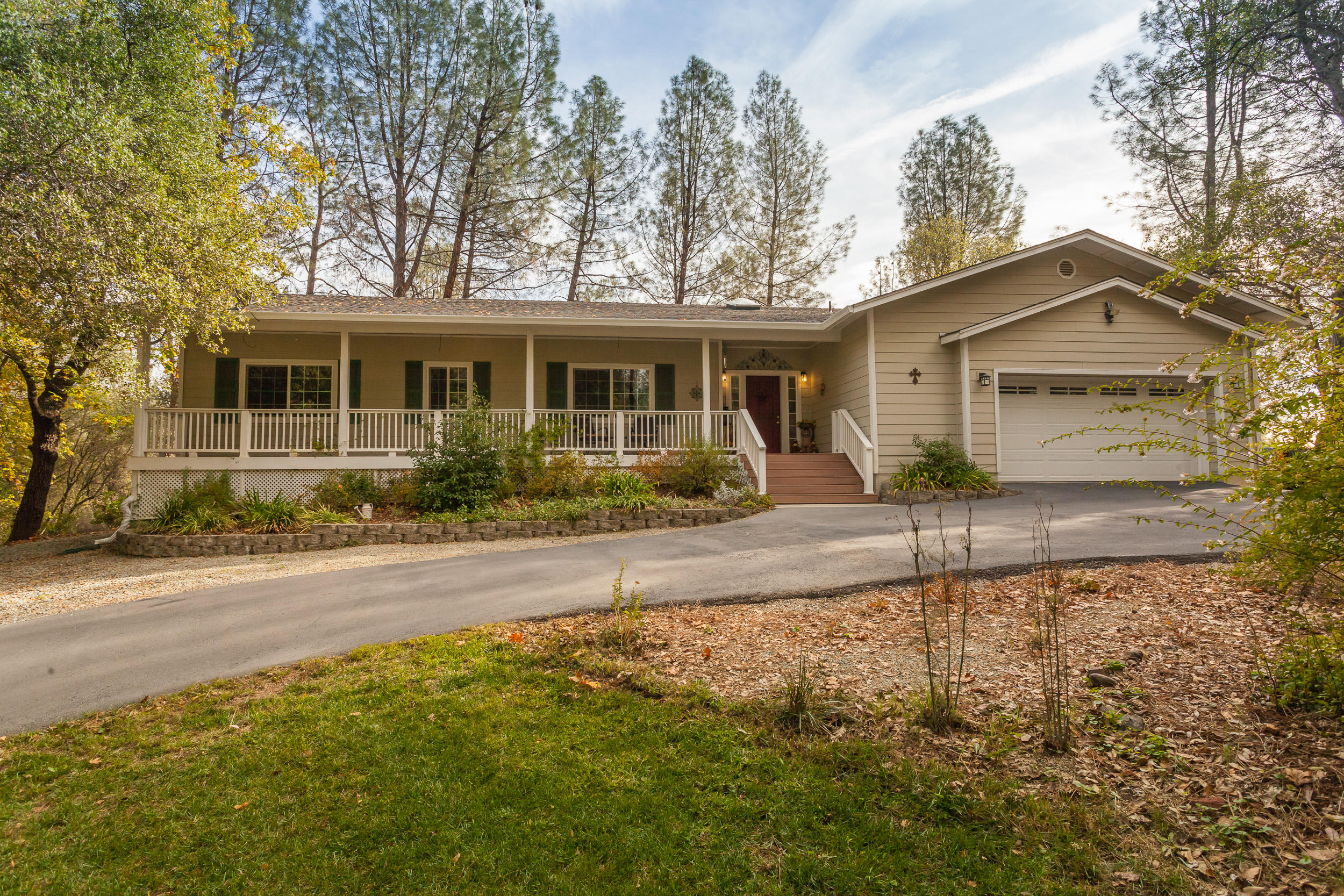 front view of a house with a yard