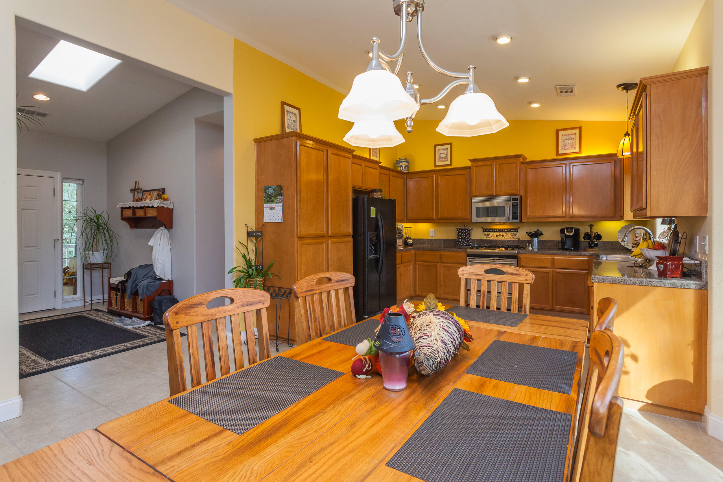 12199 Macs Road Redding, CA 96003 - Photo 11 of 36 a view of a dining room with furniture