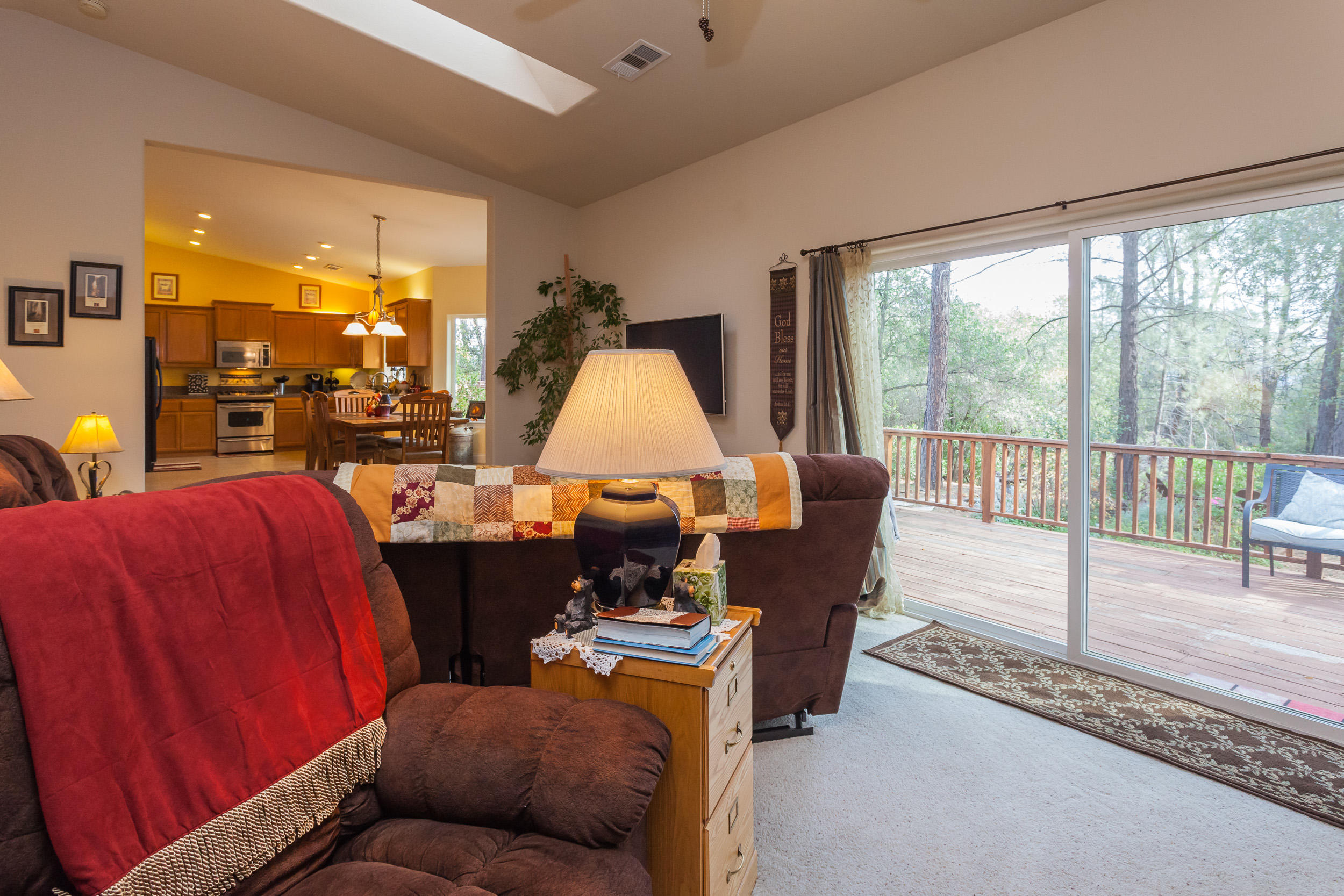 12199 Macs Road Redding, CA 96003 - Photo 15 of 36 a living room with furniture and a large window