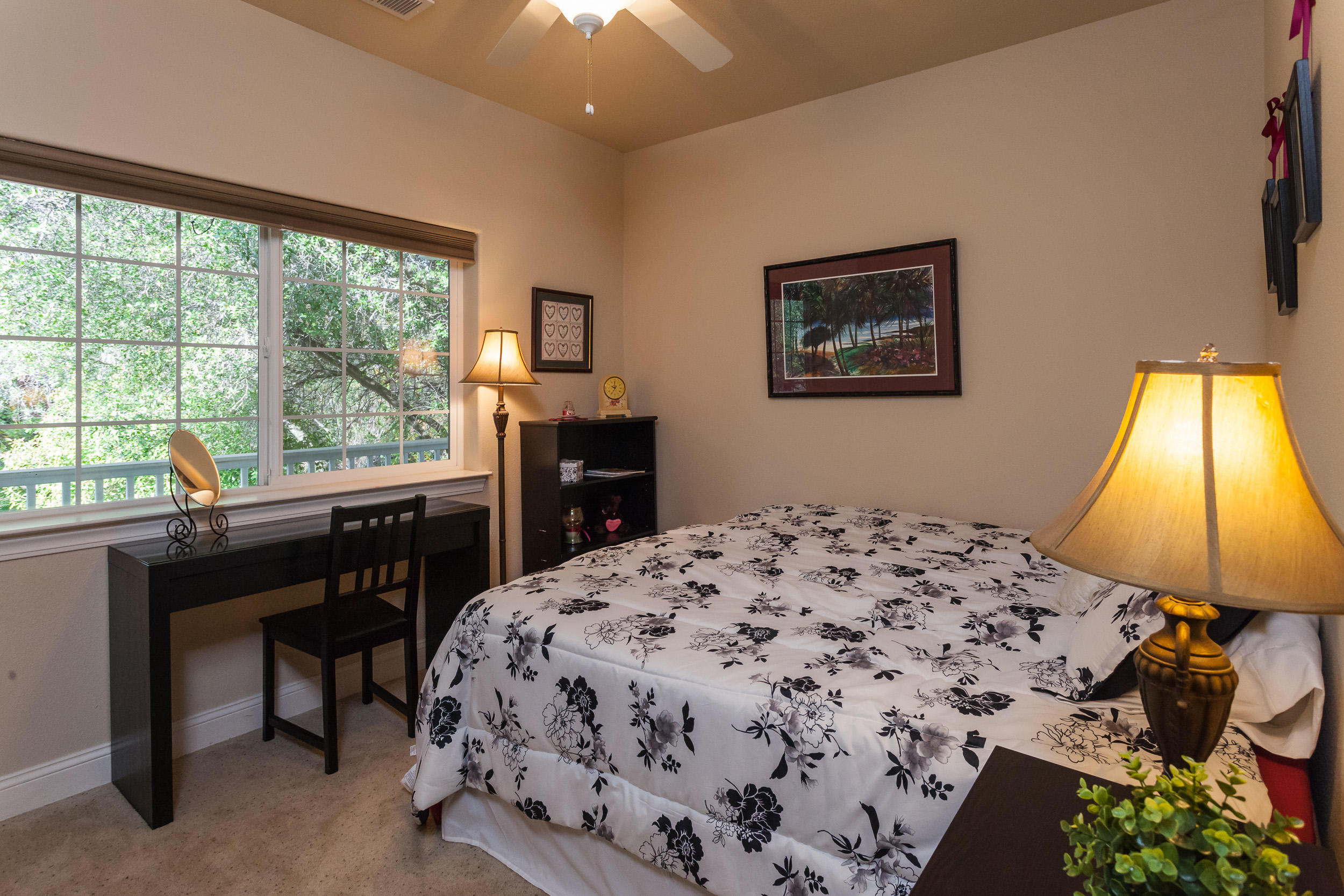 12199 Macs Road Redding, CA 96003 - Photo 22 of 36 a bedroom with a bed and a window