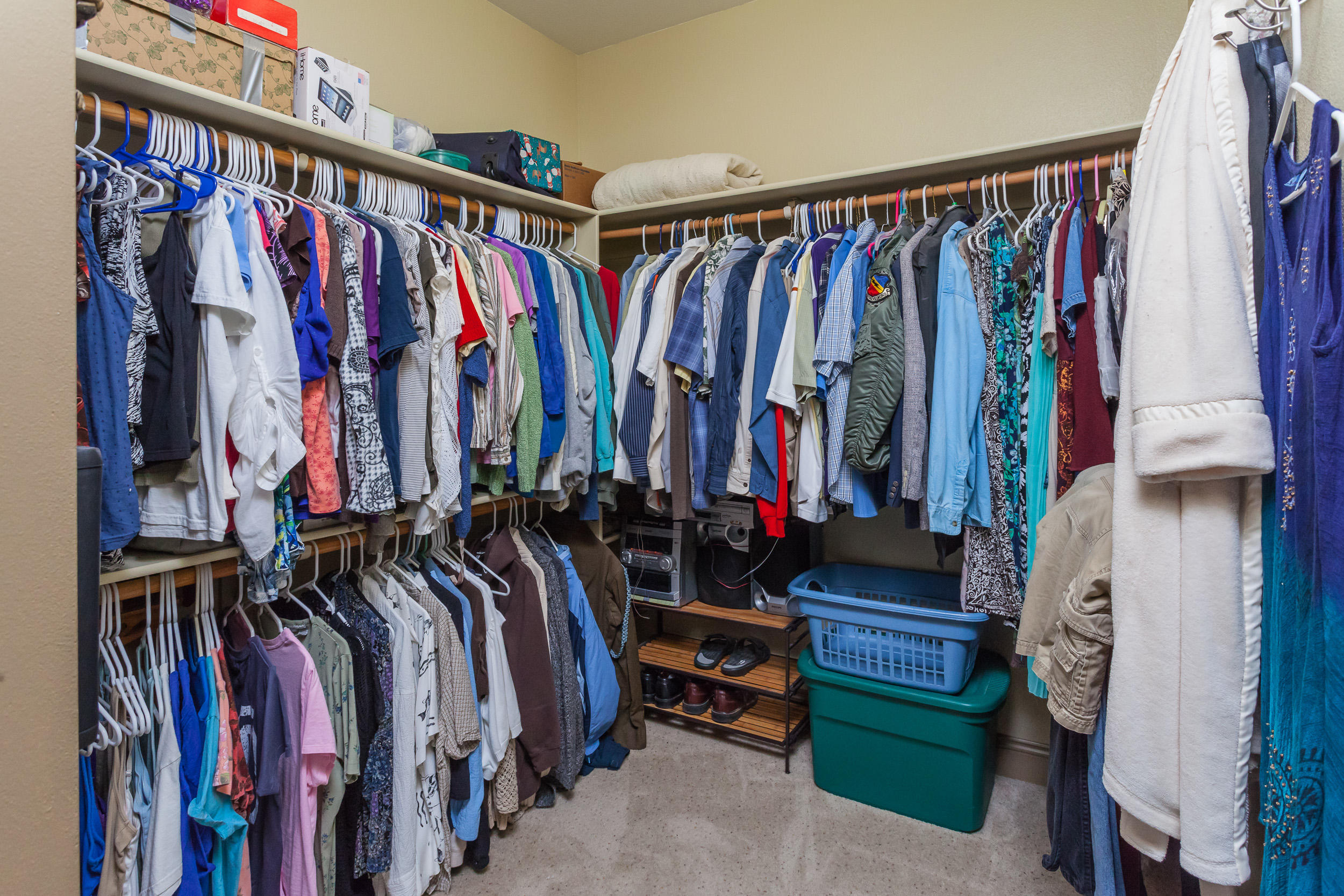 12199 Macs Road Redding, CA 96003 - Photo 31 of 36 a view of walk in closet with clothes