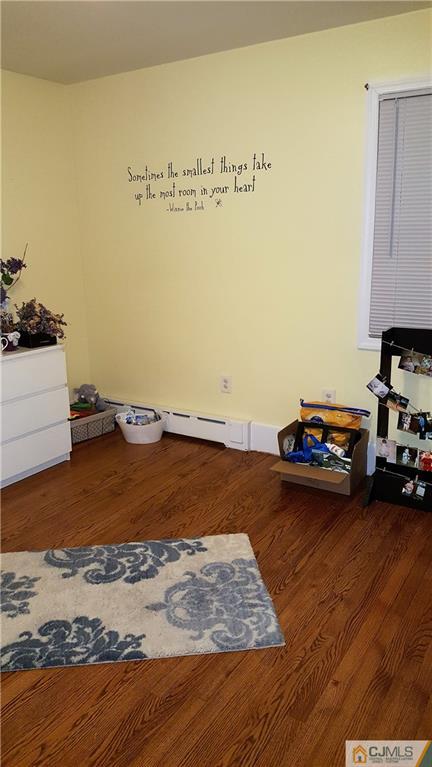 80 Jordan Road Colonia, NJ 07067 - Photo 15 of 21 a view of a room with wooden floor