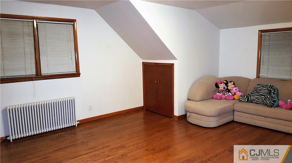 80 Jordan Road Colonia, NJ 07067 - Photo 18 of 21 a bedroom with furniture and wooden floor