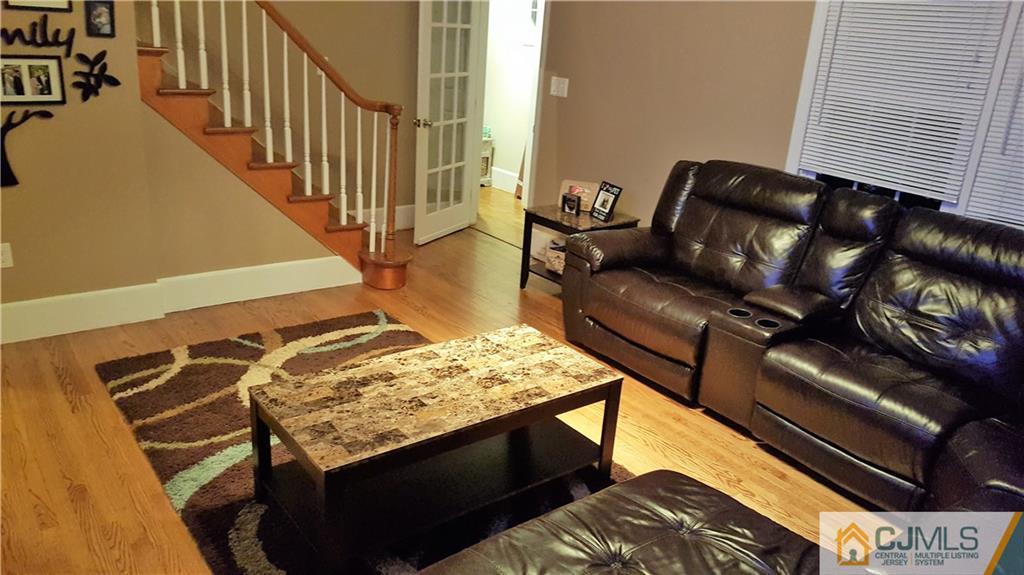 80 Jordan Road Colonia, NJ 07067 - Photo 4 of 21 a view of living room with furniture and rug