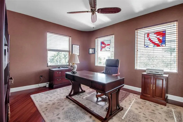 a workspace with furniture and a window