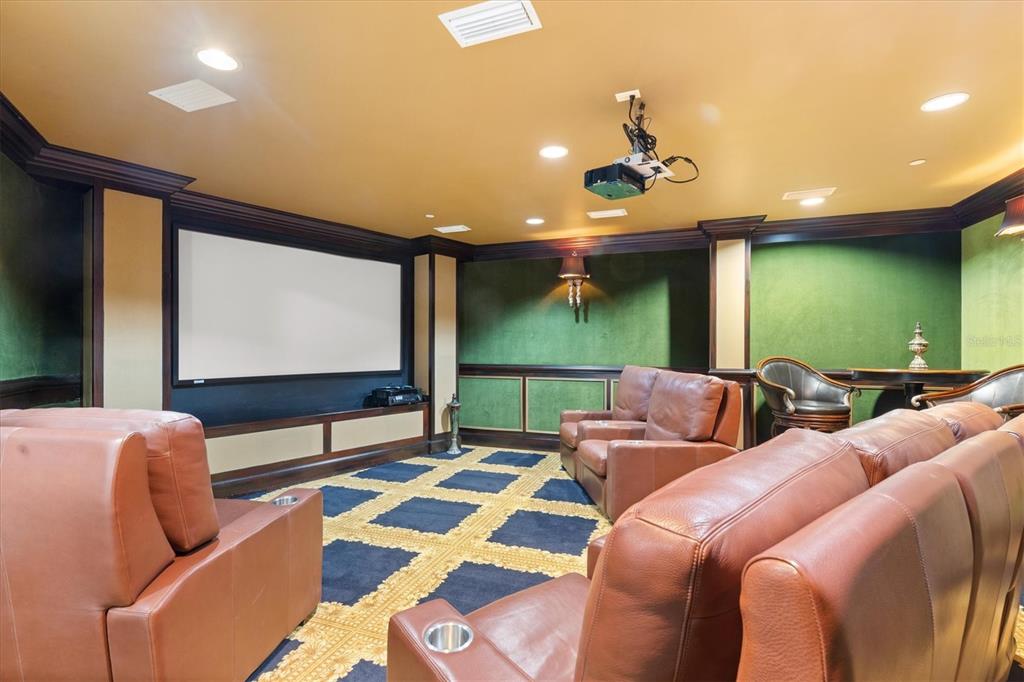 128 Golden Gate Point, Unit 301B Sarasota, FL 34236 - Photo 34 of 34 a bedroom with two beds and a flat screen tv