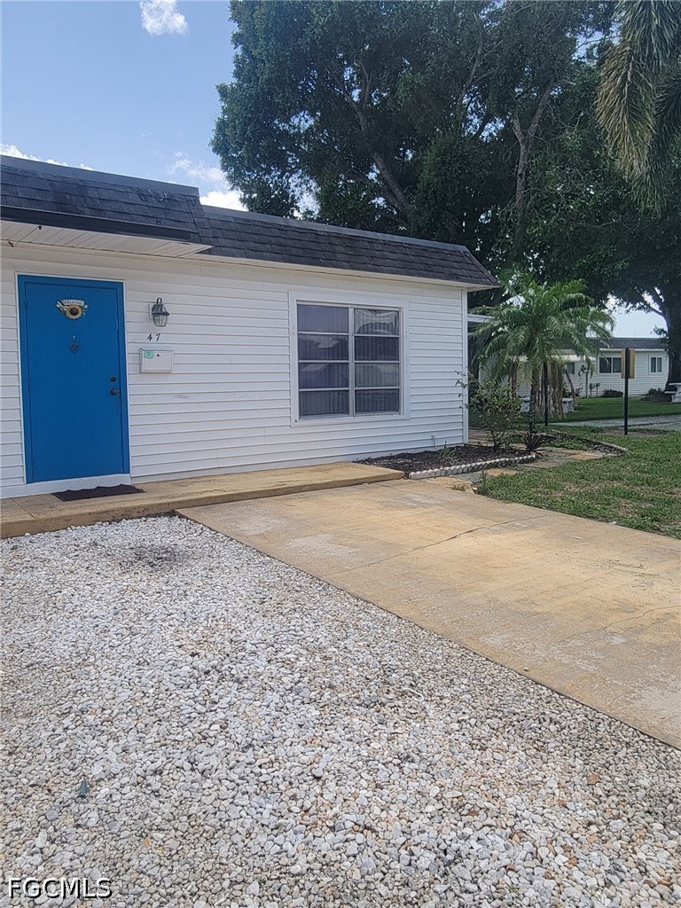 47 Tangelo Court Lehigh Acres, FL 33936 - Photo 3 of 18 a view of outdoor space and yard
