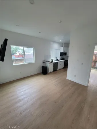 a view of room with window and projector