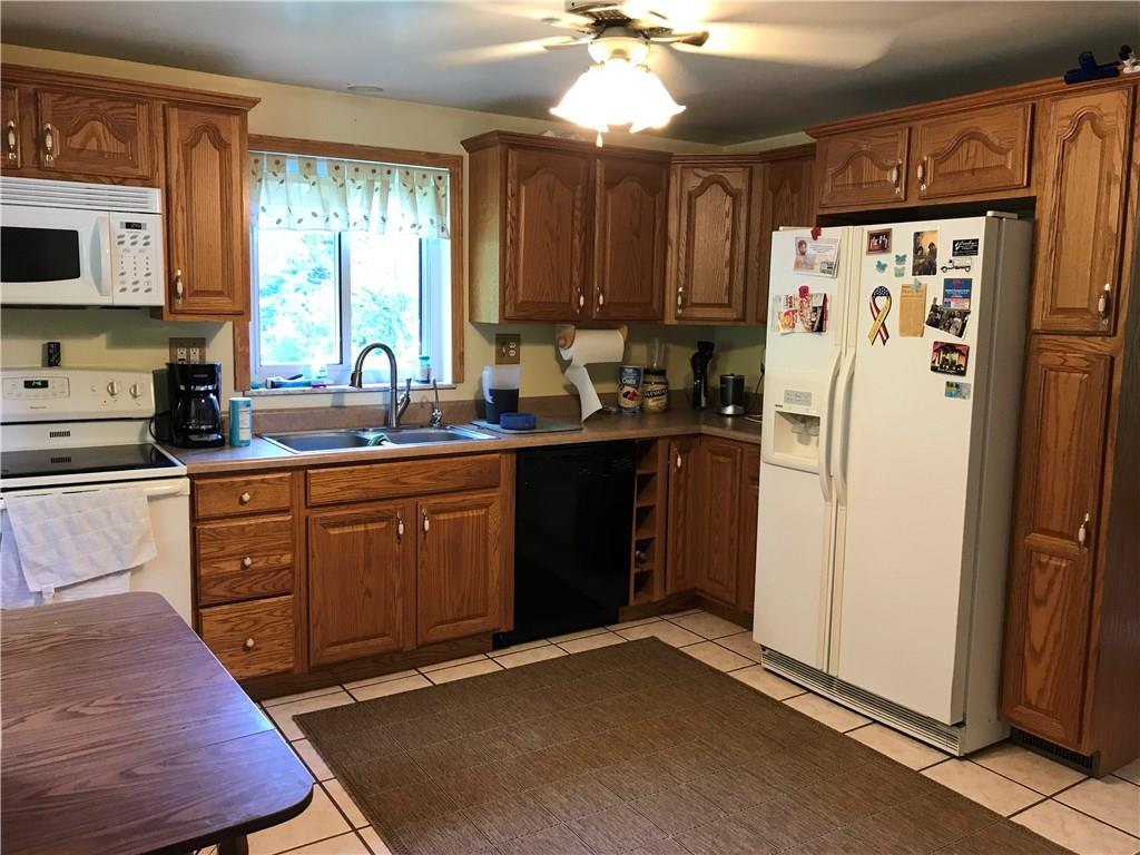 120 Cable Road New Brighton, PA 15066 - Photo 12 of 24 Kitchen with upgraded cabinetry and ceramic floor