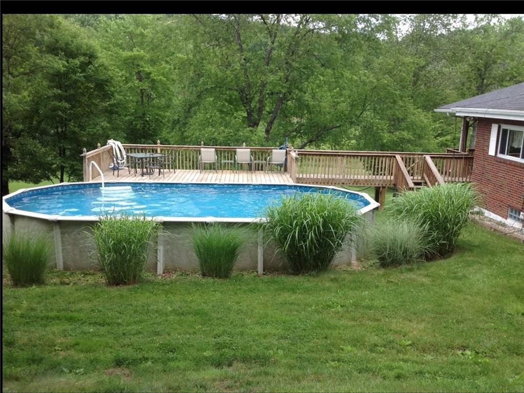 120 Cable Road New Brighton, PA 15066 - Photo 10 of 24 Refreshing pool with surrounding deck