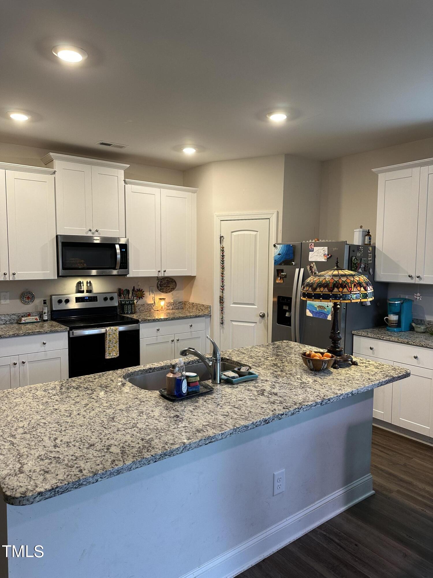 2318 Cooper Branch Road Clayton, NC 27520 - Photo 10 of 29 Kitchen Island