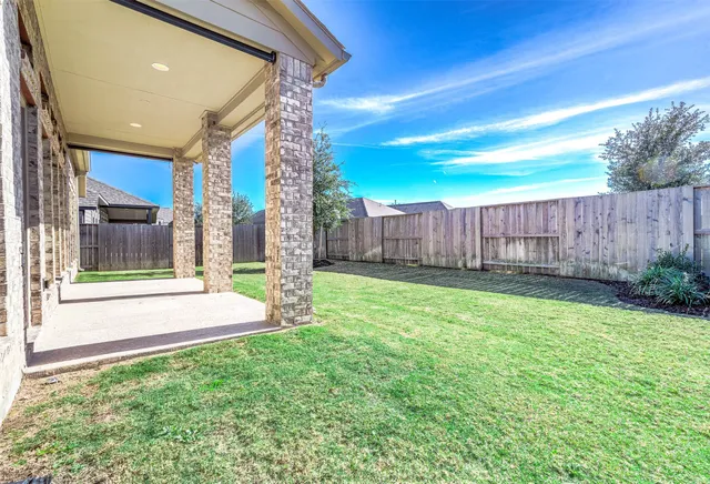 a view of a backyard with a garden