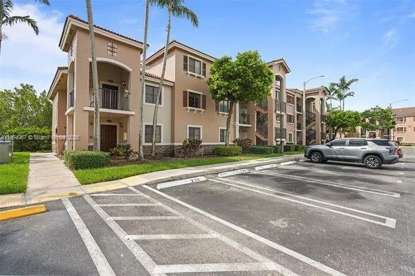 a view of a garden with an outdoor seating