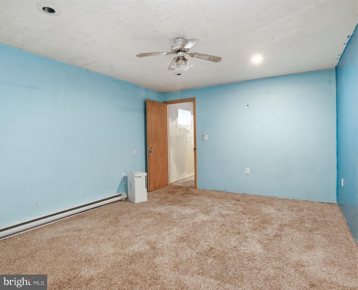 105 Ceramic Drive Newfoundland, PA 18445 - Photo 34 of 45 Spacious room with soft carpet and light.