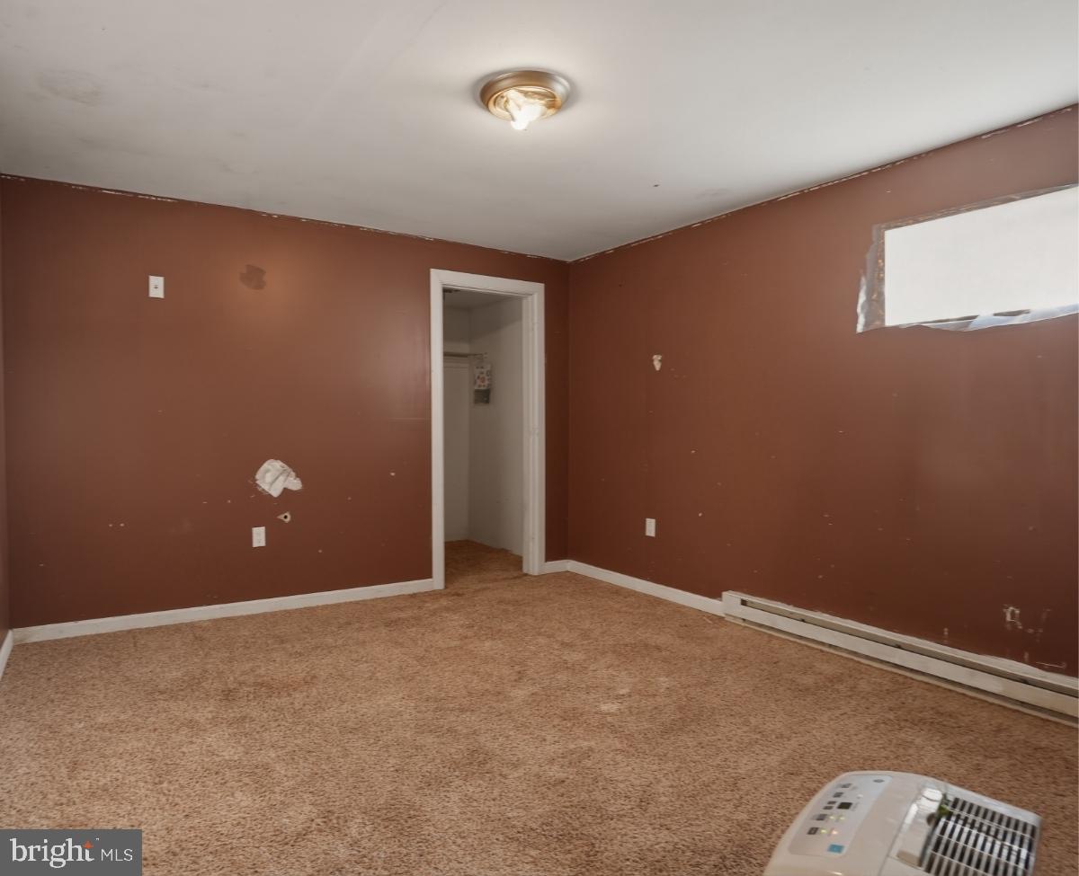 105 Ceramic Drive Newfoundland, PA 18445 - Photo 37 of 45 Cozy room with warm brown tones.