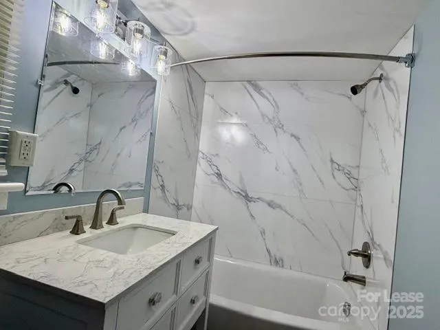 a bathroom with a sink and a toilet