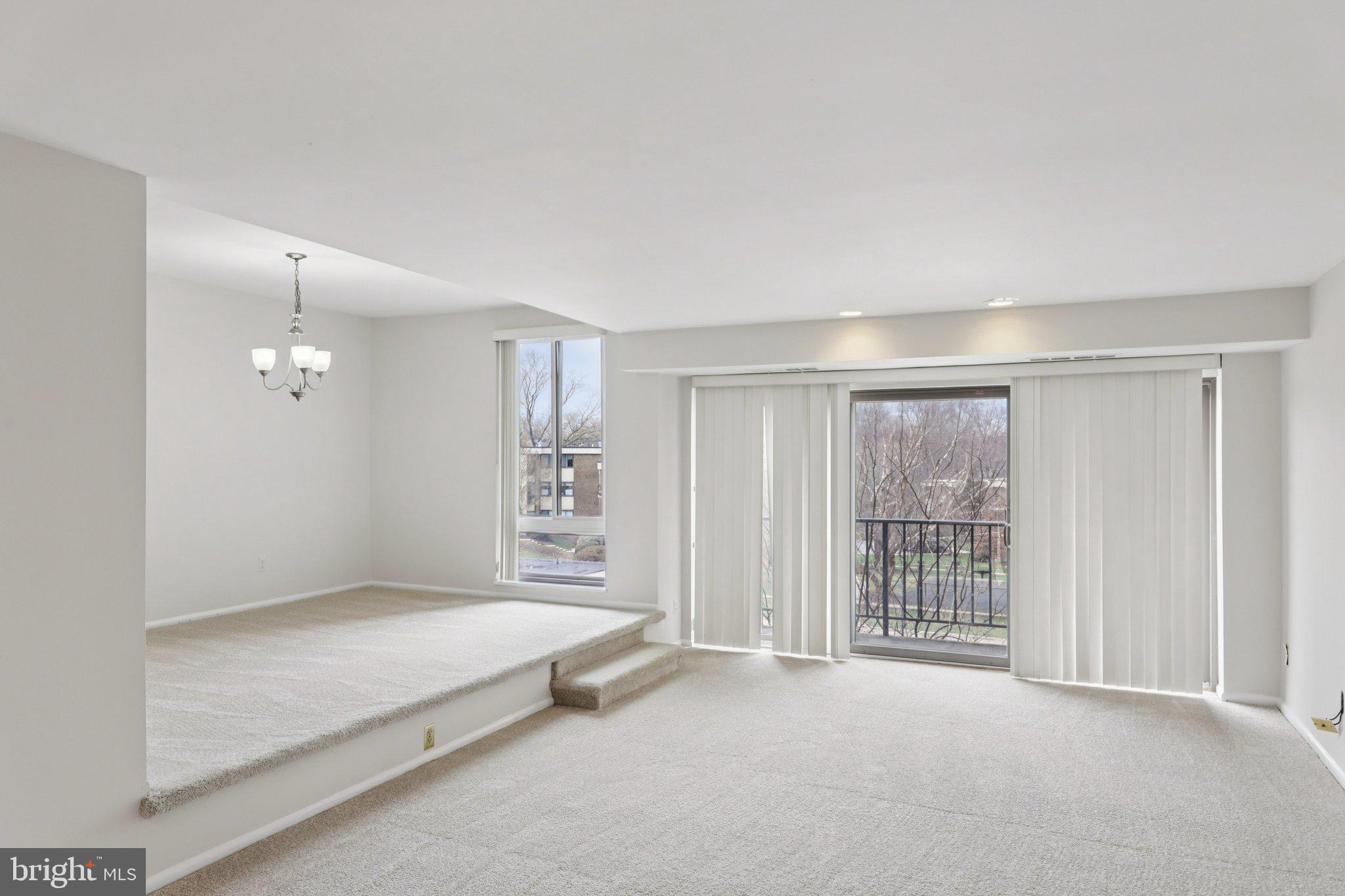 9900 Georgia Avenue, Unit 27306 Silver Spring, MD 20902 - Photo 10 of 23 Living Room with Access to the Balcony