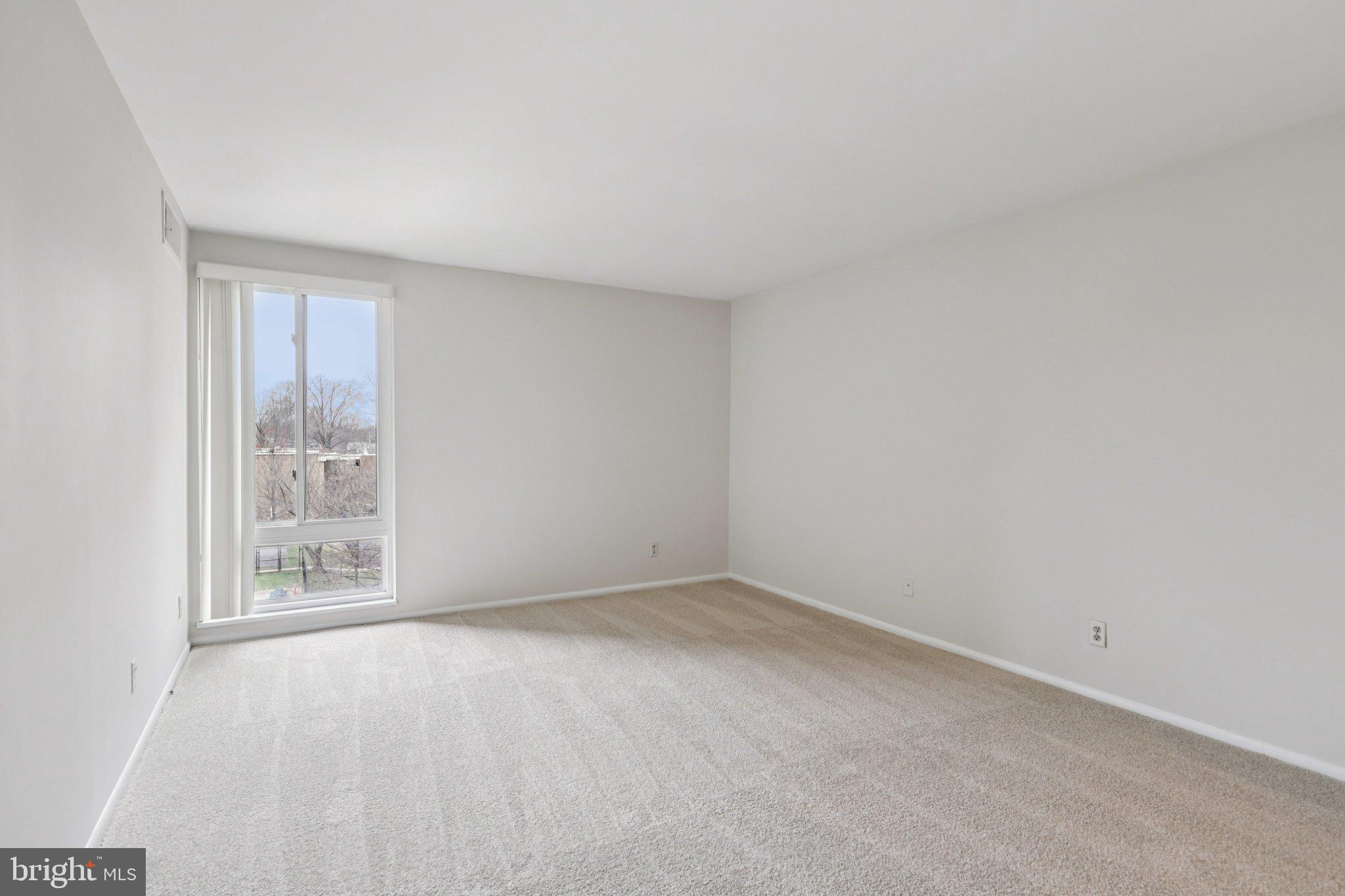 9900 Georgia Avenue, Unit 27306 Silver Spring, MD 20902 - Photo 17 of 23 Spacious Bedroom