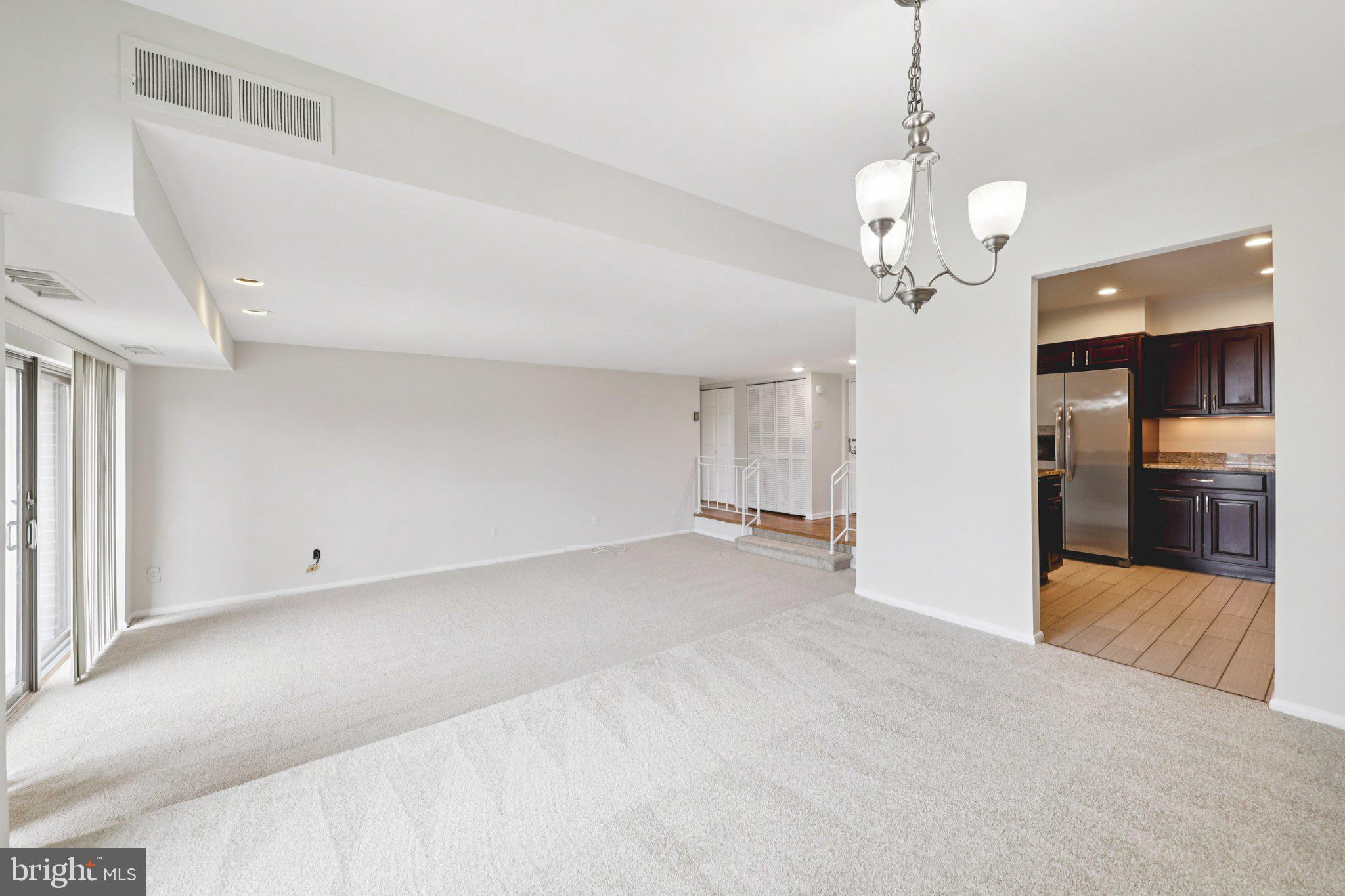 9900 Georgia Avenue, Unit 27306 Silver Spring, MD 20902 - Photo 8 of 23 Dining Room overlooking Living Room
