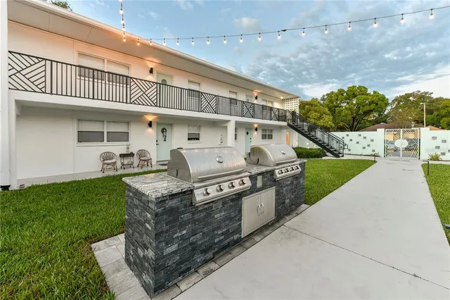 a view of front of house with a yard