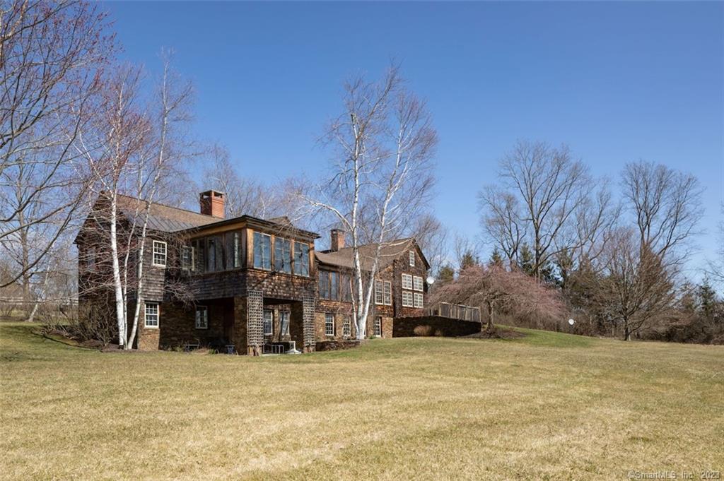 126 Long Pond Road Salisbury, CT 06039 - Photo 1 of 1 a front view of a house with a yard covered with snow