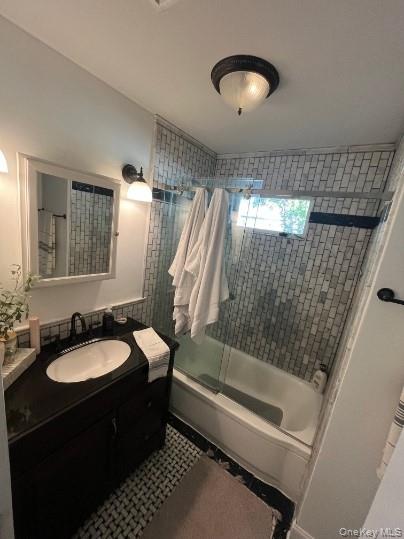 1241 Stony Brook Road Lake Grove, NY 11755 - Photo 6 of 10 a bathroom with a sink and a mirror