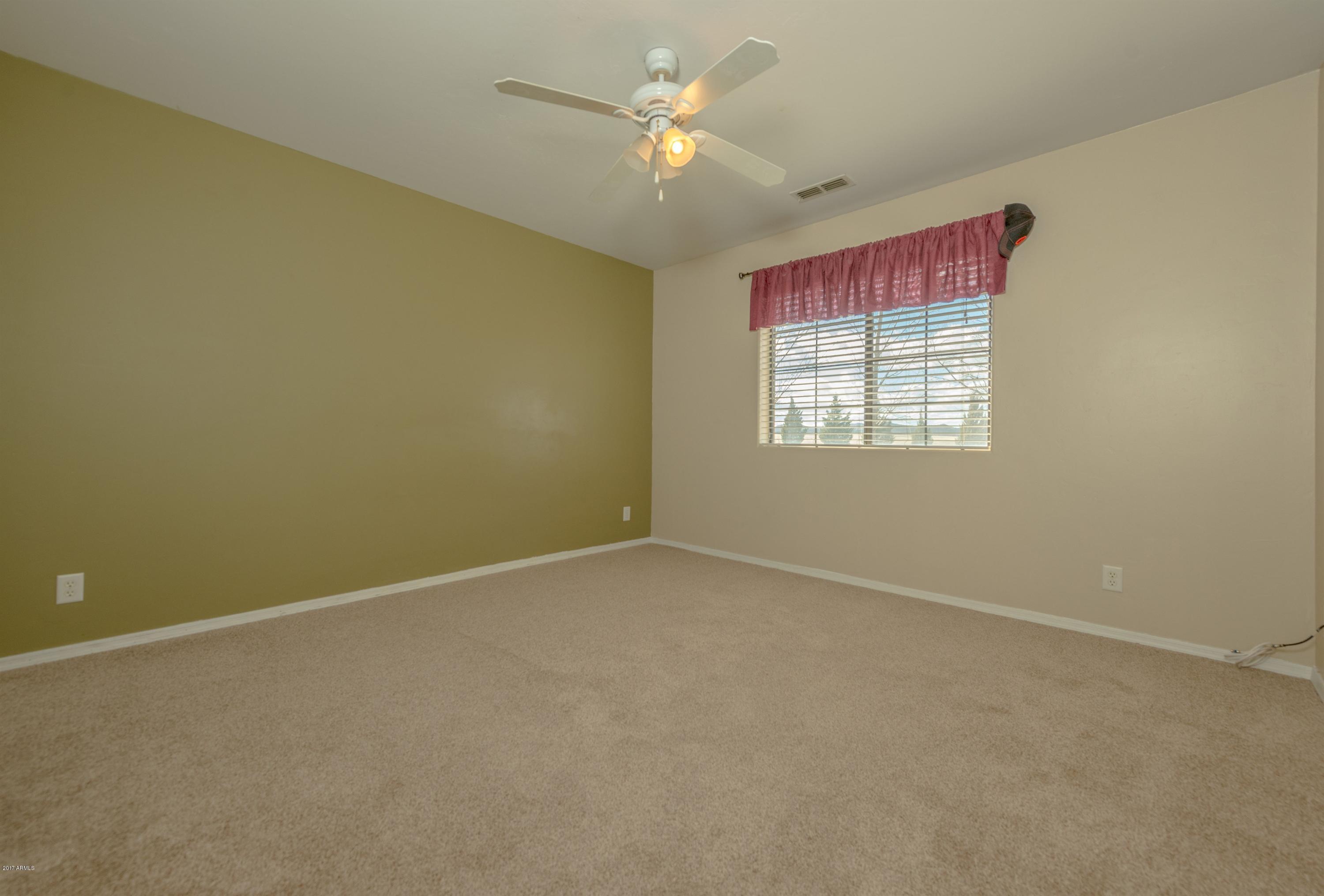 669 North Reed Road Chino Valley, AZ 86323 - Photo 16 of 66 016_Bedroom 1