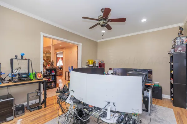 a white bath tub sitting next to a white sink