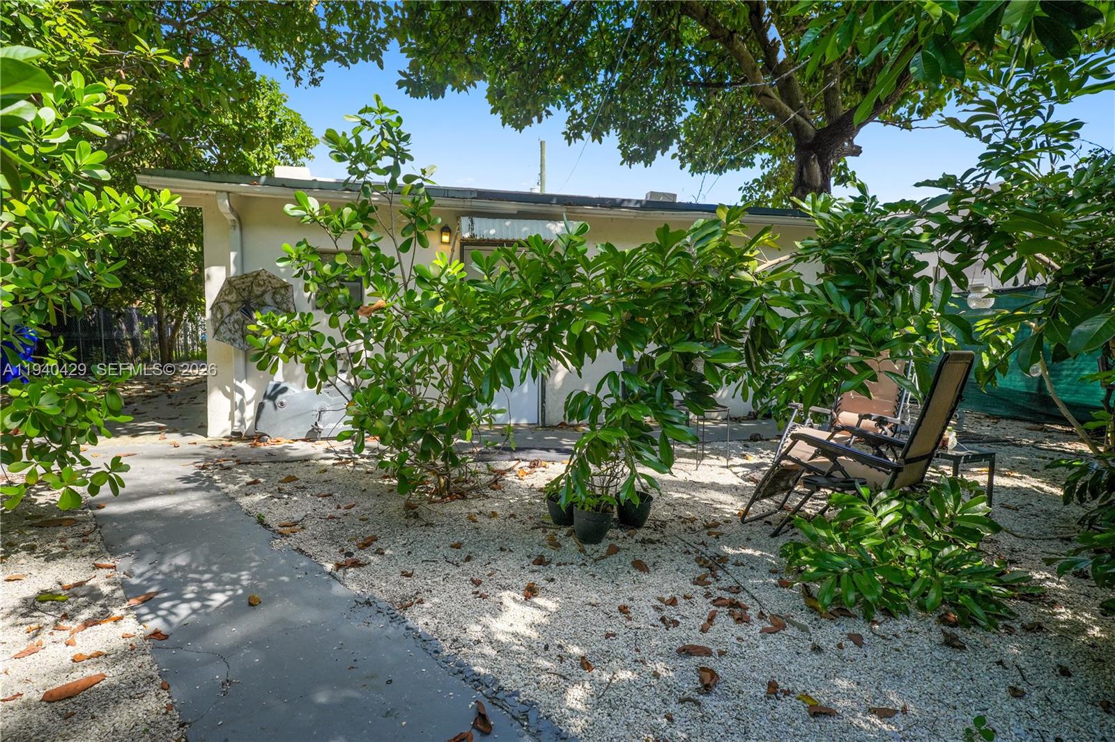 128 Northwest 53rd Street Miami, FL 33127 - Photo 22 of 22 a view of a flower in a garden