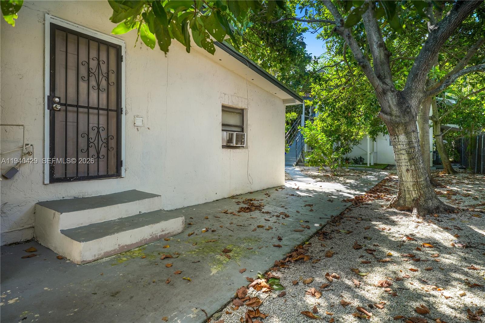 128 Northwest 53rd Street Miami, FL 33127 - Photo 9 of 22 a view of a backyard