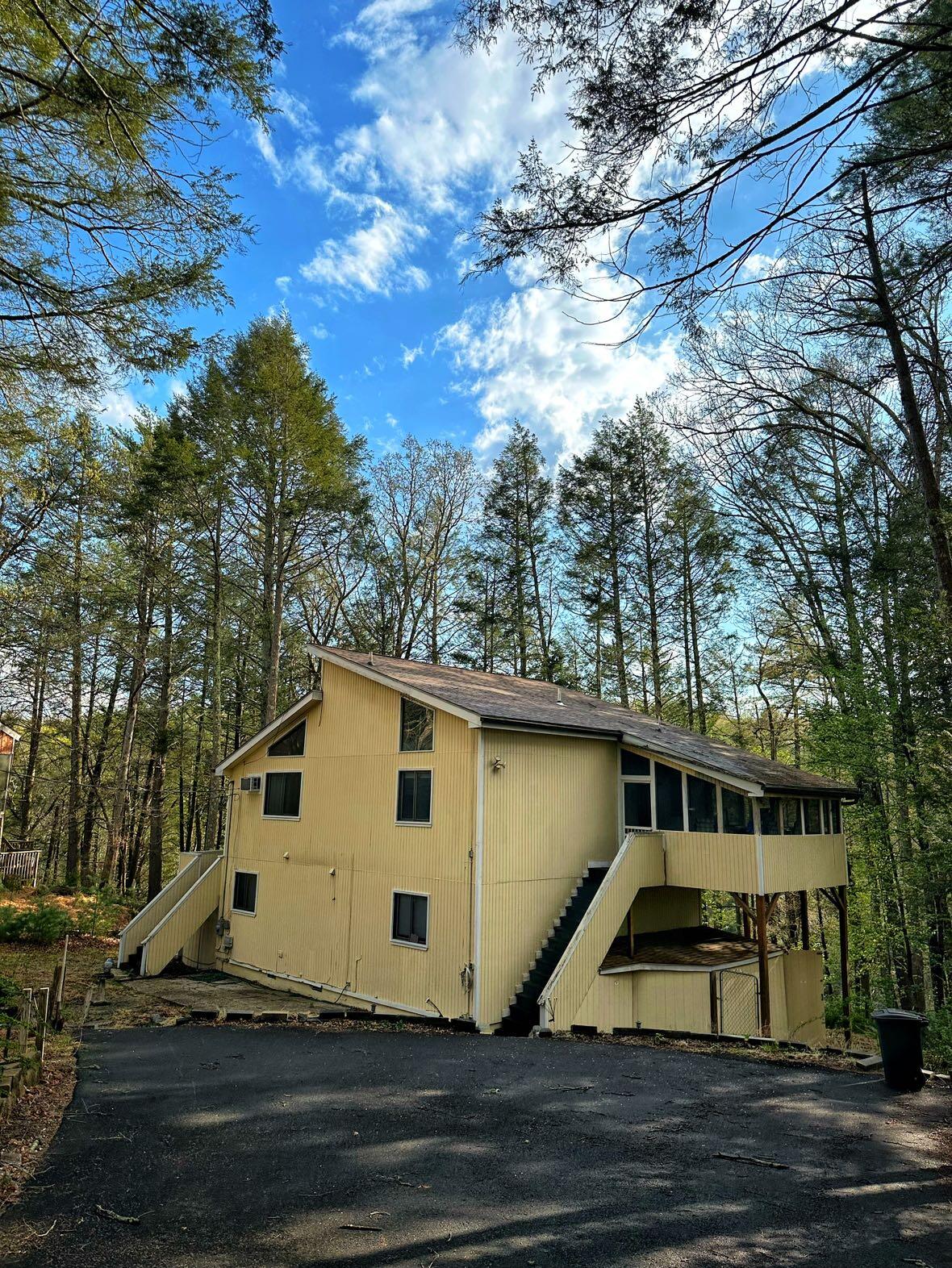 a view of a house with a yard