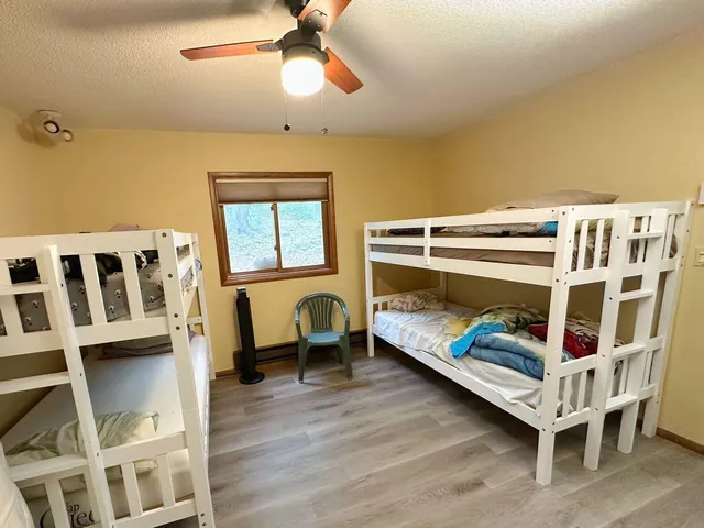 a bedroom with bunk bed