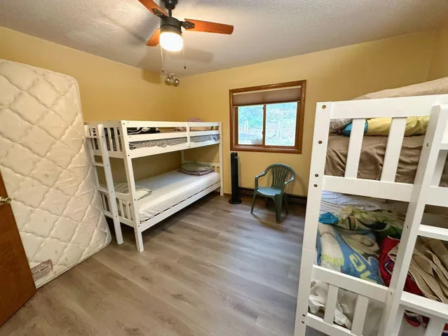 a living room with a couch and a fireplace