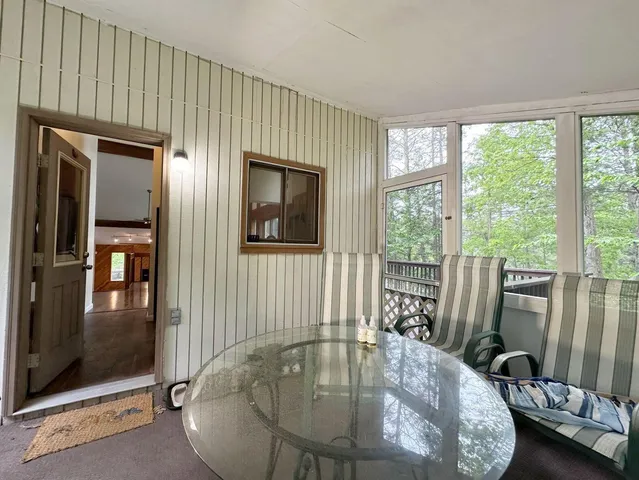 a view of a livingroom with furniture
