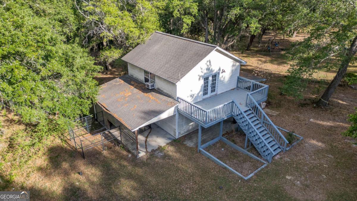 528 Gardner Road Baxley, GA 31513 - Photo 12 of 39 an aerial view of a house with a yard and balcony