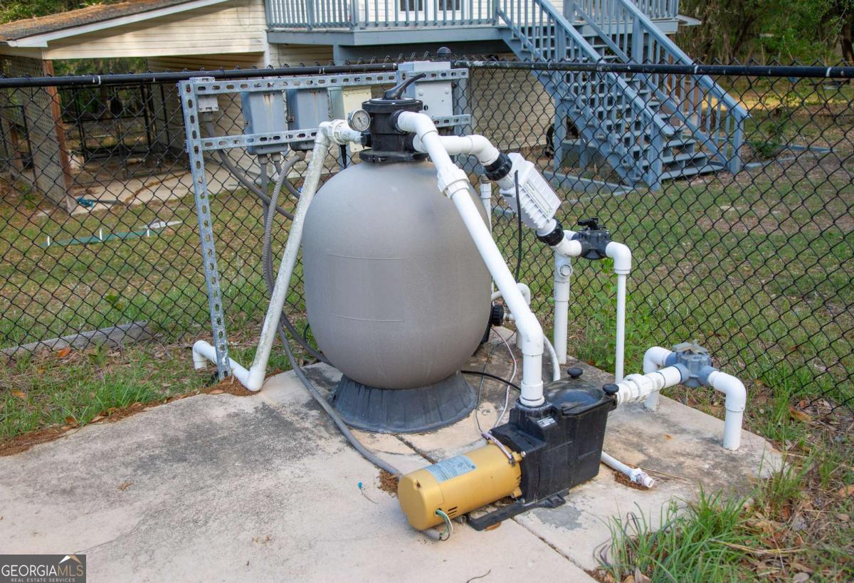528 Gardner Road Baxley, GA 31513 - Photo 19 of 39 a view of a chairs and tables in patio