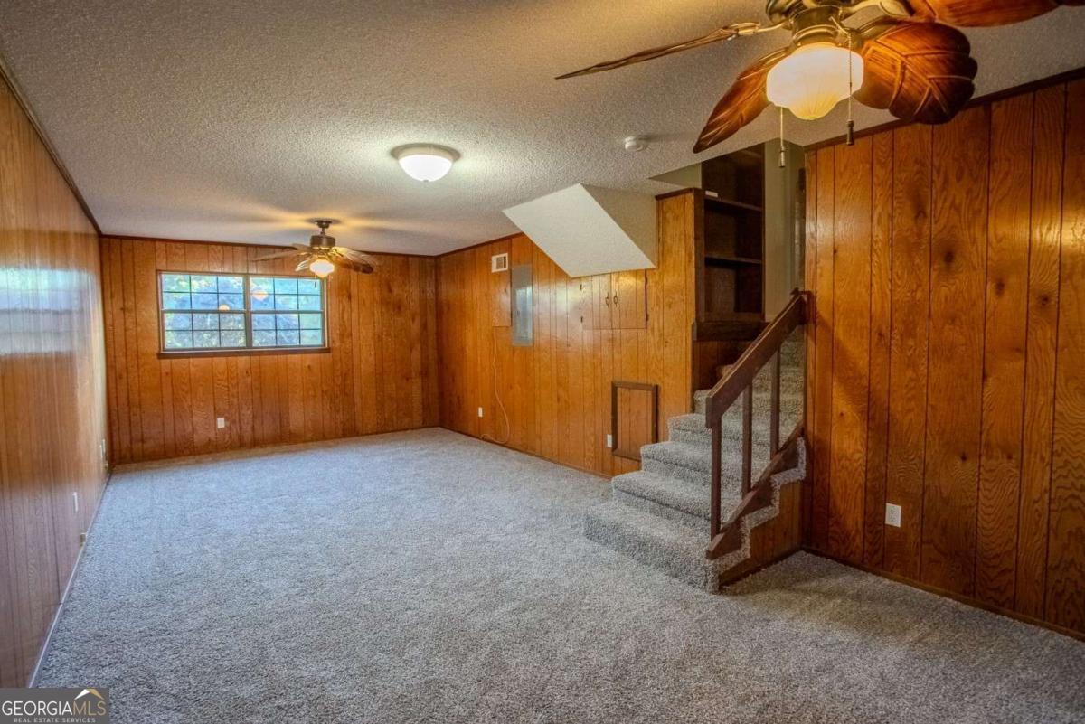 528 Gardner Road Baxley, GA 31513 - Photo 25 of 39 an empty room with windows