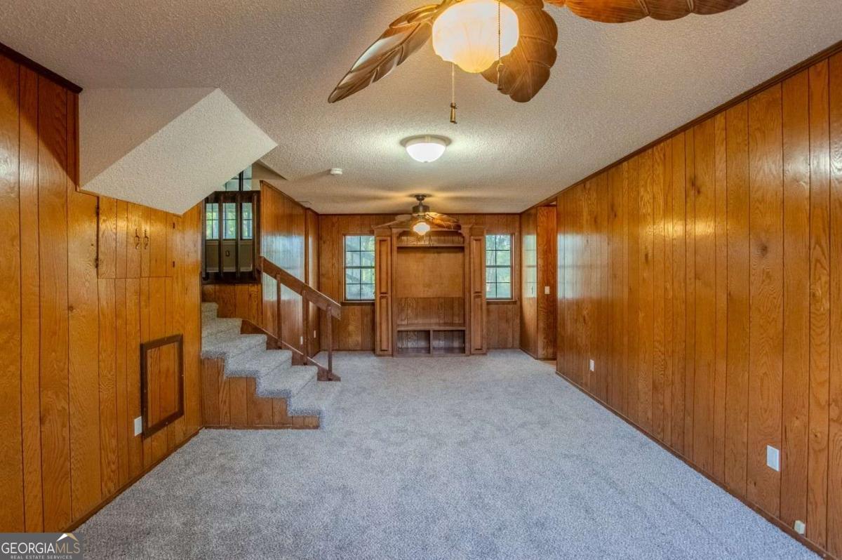 528 Gardner Road Baxley, GA 31513 - Photo 26 of 39 wooden floor in an empty room with a window