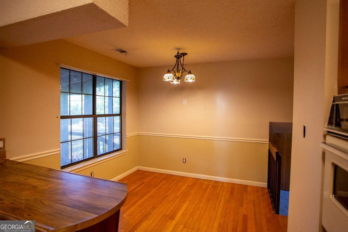 528 Gardner Road Baxley, GA 31513 - Photo 27 of 39 a view of an empty room with a window