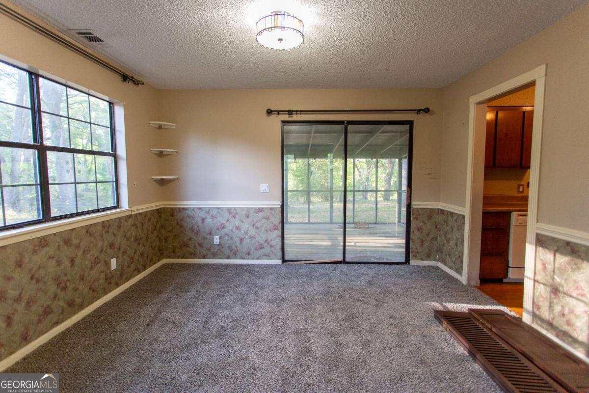 528 Gardner Road Baxley, GA 31513 - Photo 31 of 39 a view of an empty room with a window